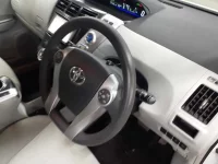 Toyota PRIUS ALPHA лот № 30332 оценка RA  с аукциона в Японии 6