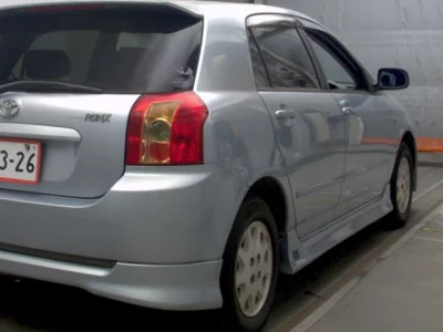 Toyota COROLLA RUNX  с аукциона в Японии