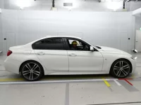 BMW 3-Series лот № 38021 оценка 3.5  с аукциона в Японии 2