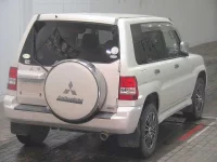 Mitsubishi PAJERO IO лот № 7074 оценка 3.5  с аукциона в Японии 3