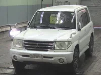 Mitsubishi PAJERO IO лот № 7074 оценка 3.5  с аукциона в Японии 2