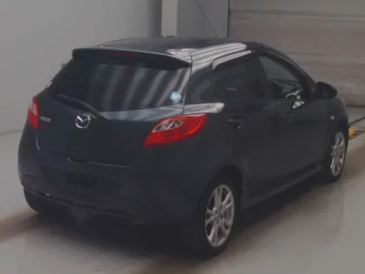 Mazda DEMIO  с аукциона в Японии