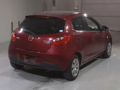 Mazda DEMIO  с аукциона в Японии