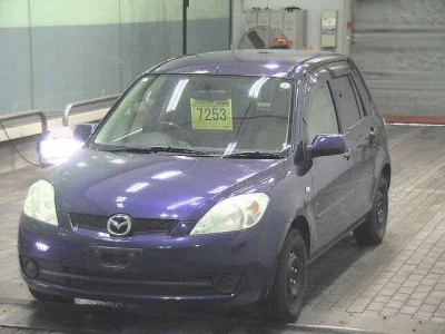 Mazda DEMIO  с аукциона в Японии