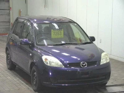 Mazda DEMIO  с аукциона в Японии