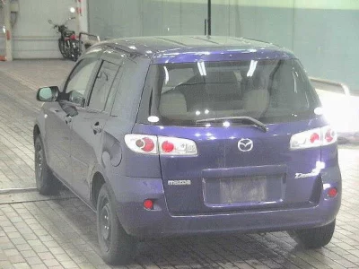Mazda DEMIO  с аукциона в Японии