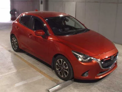 Mazda DEMIO  с аукциона в Японии