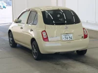 Nissan MARCH лот № 2210 оценка RA  с аукциона в Японии 1