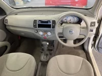 Nissan MARCH лот № 2210 оценка RA  с аукциона в Японии 4