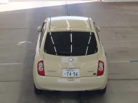 Nissan MARCH лот № 2210 оценка RA  с аукциона в Японии 2