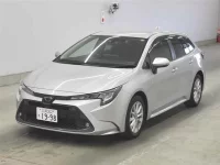 Toyota COROLLA TOURING лот № 70064 оценка 3.5  с аукциона в Японии 3