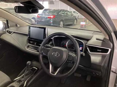 Toyota COROLLA TOURING  с аукциона в Японии