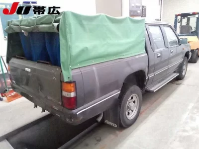 Mitsubishi STRADA  с аукциона в Японии