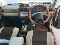 Mitsubishi PAJERO IO лот № 2553 оценка 4  с аукциона в Японии 4