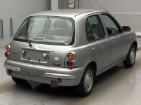 Nissan MARCH лот № 4055 оценка R  с аукциона в Японии 1