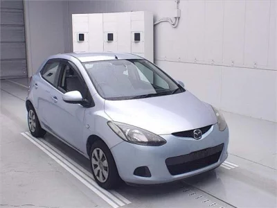 Mazda DEMIO  с аукциона в Японии