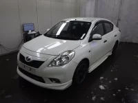 Nissan LATIO лот № 26004 оценка R  с аукциона в Японии 1