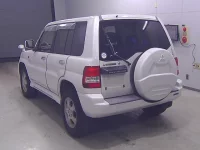 Mitsubishi PAJERO IO лот № 10180 оценка 3  с аукциона в Японии 3