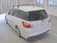 Subaru EXIGA лот № 1101 оценка 3.5  с аукциона в Японии 1