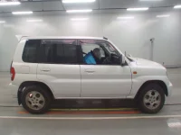 Mitsubishi PAJERO IO лот № 10283 оценка RA  с аукциона в Японии 2