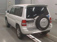 Mitsubishi PAJERO IO лот № 10283 оценка RA  с аукциона в Японии 5