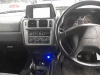 Mitsubishi PAJERO IO лот № 10283 оценка RA  с аукциона в Японии 8