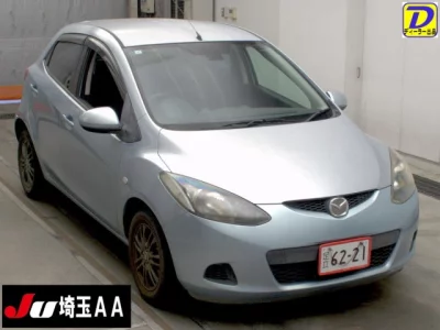 Mazda DEMIO  с аукциона в Японии
