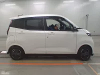 Nissan SAKURA лот № 345 оценка 5  с аукциона в Японии 2