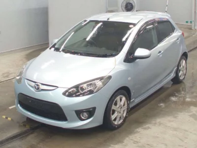 Mazda DEMIO  с аукциона в Японии