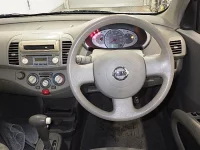 Nissan MARCH лот № 4087 оценка 3.5  с аукциона в Японии 2