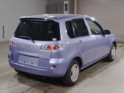 Mazda DEMIO  с аукциона в Японии