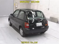 Nissan MARCH лот № 143 оценка 3.5  с аукциона в Японии 1
