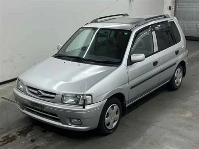 Mazda DEMIO  с аукциона в Японии