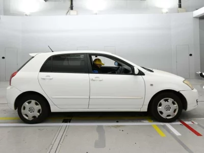 Toyota COROLLA RUNX  с аукциона в Японии