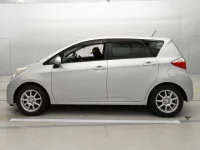 Toyota RACTIS лот № 30069 оценка 4  с аукциона в Японии 3