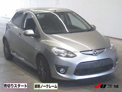 Mazda DEMIO  с аукциона в Японии