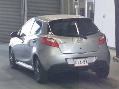 Mazda DEMIO  с аукциона в Японии