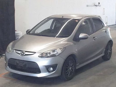 Mazda DEMIO  с аукциона в Японии