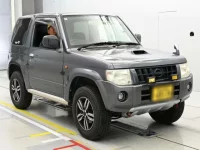 Nissan KIX лот № 13087 оценка 3.5  с аукциона в Японии 4