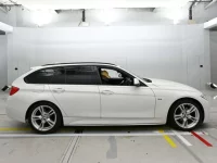 BMW 3-Series лот № 90424 оценка 3.5  с аукциона в Японии 2