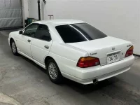 Nissan LAUREL лот № 70176 оценка 4  с аукциона в Японии 1