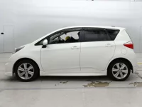 Toyota RACTIS лот № 30406 оценка 4  с аукциона в Японии 3