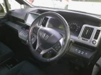 Honda STEP WAGON лот № 30450 оценка 4  с аукциона в Японии 8