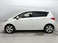 Toyota RACTIS лот № 30489 оценка 4  с аукциона в Японии 3