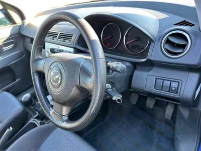 Mazda DEMIO  с аукциона в Японии
