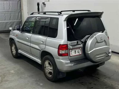 Mitsubishi PAJERO IO  с аукциона в Японии