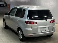 Mazda DEMIO лот № 2009 оценка 3.5  с аукциона в Японии 1