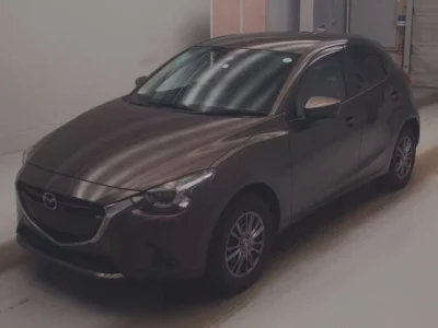 Mazda DEMIO  с аукциона в Японии