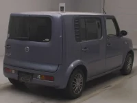 Nissan CUBECUBIC лот № 89039 оценка 3.5  с аукциона в Японии 1