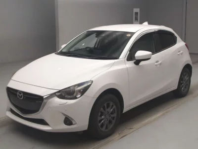 Mazda DEMIO  с аукциона в Японии